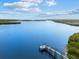 Scenic waterfront view from home featuring a private dock for enjoying direct access to the water at 38 Riverfront Dr, Venice, FL 34293