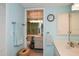 Bright bathroom with double vanity and updated fixtures at 450 Wexford Cir # 106, Venice, FL 34293