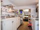 Workshop area in garage with shelving and storage at 450 Wexford Cir # 106, Venice, FL 34293