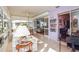 Spacious lanai with seating area and view of the interior at 450 Wexford Cir # 106, Venice, FL 34293