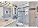 Clean bathroom featuring a shower and storage at 460 Base E Ave # 113, Venice, FL 34285