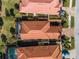 Aerial view of house and neighborhood, showing roof and landscaping at 482 Montelluna Dr, North Venice, FL 34275