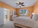 Bright bedroom with a view and dresser at 482 Montelluna Dr, North Venice, FL 34275