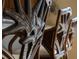 Close-up of intricately carved wooden kitchen chairs at 482 Montelluna Dr, North Venice, FL 34275