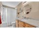 Clean bathroom with updated vanity and shower at 507 Foxwood Blvd # 4, Englewood, FL 34223