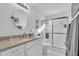 Updated bathroom with a modern vanity and shower at 507 Foxwood Blvd # 4, Englewood, FL 34223