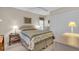 Bright bedroom with a double bed and ample closet space at 507 Foxwood Blvd # 4, Englewood, FL 34223