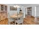 Charming dining area with an oval table and matching chairs at 507 Foxwood Blvd # 4, Englewood, FL 34223