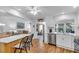 Eat-in kitchen with island and stainless steel appliances at 507 Foxwood Blvd # 4, Englewood, FL 34223
