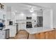 Updated kitchen with white shaker cabinets, granite counters at 507 Foxwood Blvd # 4, Englewood, FL 34223