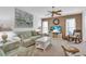 Living room with a sofa, two armchairs, and a rocking chair at 507 Foxwood Blvd # 4, Englewood, FL 34223