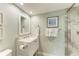 Bathroom with a vanity, toilet, and walk-in shower at 5125 Gulf Of Mexico Dr # 7, Longboat Key, FL 34228