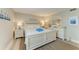 Bright bedroom with a queen-size bed, dresser, and nightstands at 5125 Gulf Of Mexico Dr # 7, Longboat Key, FL 34228