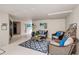 Relaxing common area with wicker furniture at 5125 Gulf Of Mexico Dr # 7, Longboat Key, FL 34228