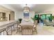Dining area with a view of the living room and kitchen at 5125 Gulf Of Mexico Dr # 7, Longboat Key, FL 34228