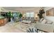 Living room features light-grey sofas and coastal decor at 5125 Gulf Of Mexico Dr # 7, Longboat Key, FL 34228