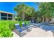 Relaxing patio with lounge chairs and gazebo, perfect for outdoor enjoyment at 5125 Gulf Of Mexico Dr # 7, Longboat Key, FL 34228
