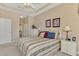 Bedroom with ensuite bathroom and walk-in closet at 5704 Whispering Oaks Dr, North Port, FL 34287