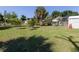 Spacious backyard with large grassy area at 601 E Seminole Dr, Venice, FL 34293
