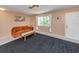 Living room with sofa, coffee table, and entry to exterior at 601 E Seminole Dr, Venice, FL 34293