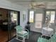 Spacious sunroom with ample natural light and seating at 607 Cervina Dr, Venice, FL 34285