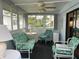 Bright and airy sunroom with multiple seating options at 607 Cervina Dr, Venice, FL 34285