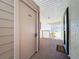 Condo front door entrance on a neutral colored carpeted floor at 654 Bird Bay E Dr # 206, Venice, FL 34285
