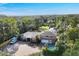 Two story house, large lot, detached garage, and boat at 690 Percheron, Nokomis, FL 34275