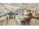 Kitchen with large island and stainless steel appliances at 690 Percheron, Nokomis, FL 34275