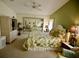 Bright bedroom with mirrored closet and calming decor at 701 S Green Cir, Venice, FL 34285