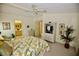 Spacious bedroom with mirrored closet and calming decor at 701 S Green Cir, Venice, FL 34285