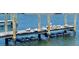 Pelicans resting on a waterfront dock at 701 S Green Cir, Venice, FL 34285