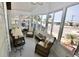 Relaxing sunroom with ample seating and gorgeous views at 701 S Green Cir, Venice, FL 34285
