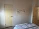 Bedroom with simple decor and additional closet space at 723 Locarno Dr, Venice, FL 34285