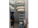 Well-organized closet with shelving and storage containers at 723 Locarno Dr, Venice, FL 34285