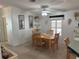 Dining room with wooden table and chairs at 723 Locarno Dr, Venice, FL 34285