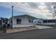 Mobile home exterior view, showing the front and a bit of the side at 723 Locarno Dr, Venice, FL 34285