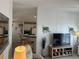 Kitchen with breakfast bar and white cabinets at 723 Locarno Dr, Venice, FL 34285