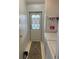 Laundry room with washer, dryer and exterior access at 723 Locarno Dr, Venice, FL 34285