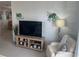 Living room with TV stand and comfy seating at 723 Locarno Dr, Venice, FL 34285