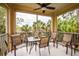 Spacious screened balcony with seating area at 780 Montrose Dr # 202, Venice, FL 34293