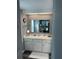 Clean bathroom with vanity, mirror, and spacious counter at 788 Cervina Dr, Venice, FL 34285