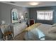 Main bedroom with king-size bed and dresser at 788 Cervina Dr, Venice, FL 34285