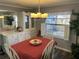 Spacious dining area with a table for four and built-in hutch at 788 Cervina Dr, Venice, FL 34285