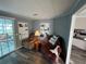 Relaxing living room with two comfy armchairs and built-in shelves at 788 Cervina Dr, Venice, FL 34285