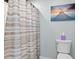 Guest bathroom with shower/tub combo at 869 Cascade Ct, Englewood, FL 34223