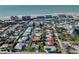 Aerial view showcasing a single-Gathering home's location in a residential neighborhood near the coast at 900 Osprey St, Venice, FL 34285