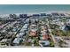 Aerial view showcasing a single-Gathering home's location in a residential neighborhood near the coast at 900 Osprey St, Venice, FL 34285