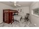 Cozy bedroom with a built-in bunk bed and rocking chair at 900 Osprey St, Venice, FL 34285