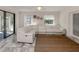 Relaxing living room with large sectional sofa and sliding doors to patio at 900 Osprey St, Venice, FL 34285